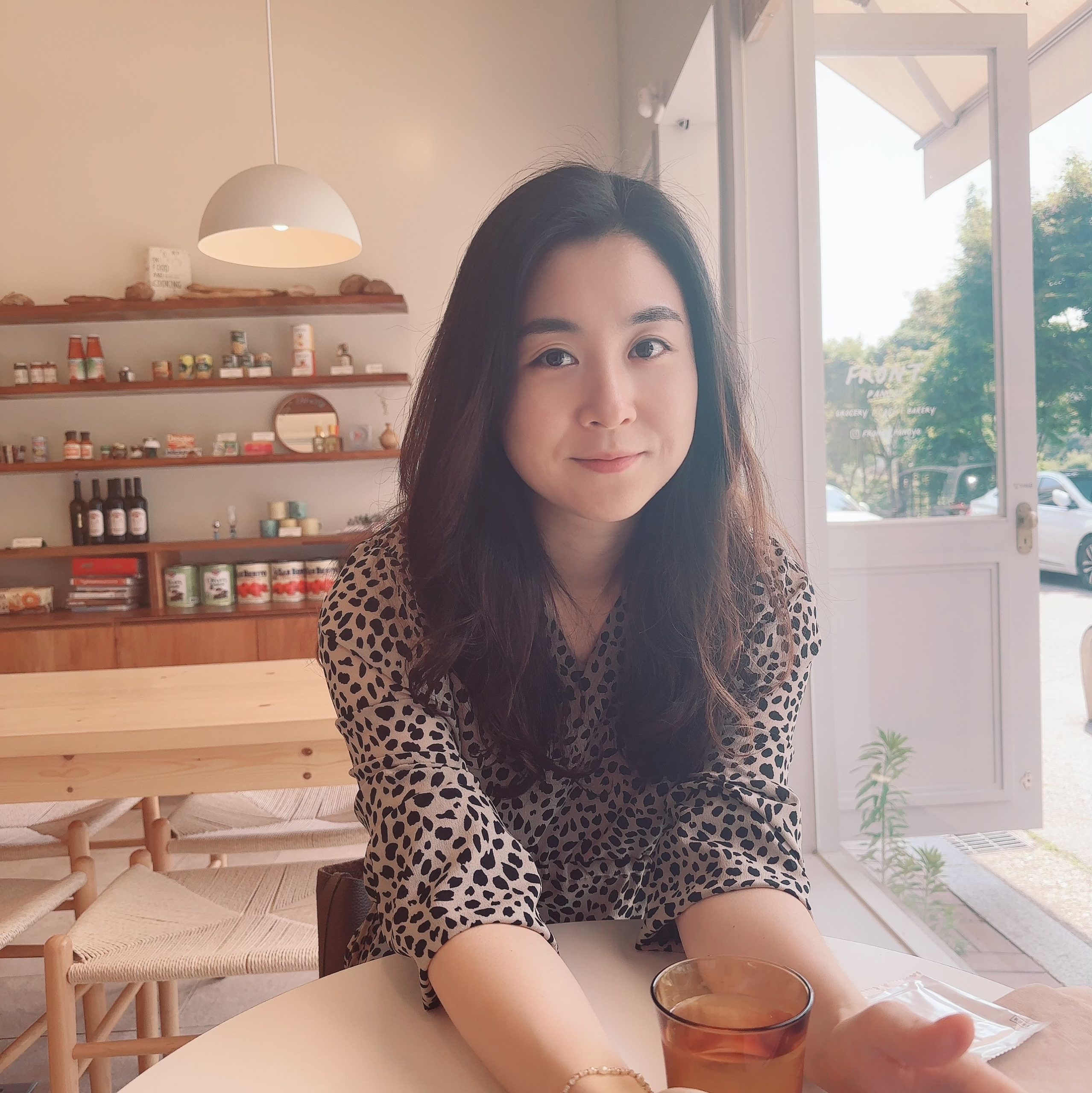 Hyeonjin An sitting at a table